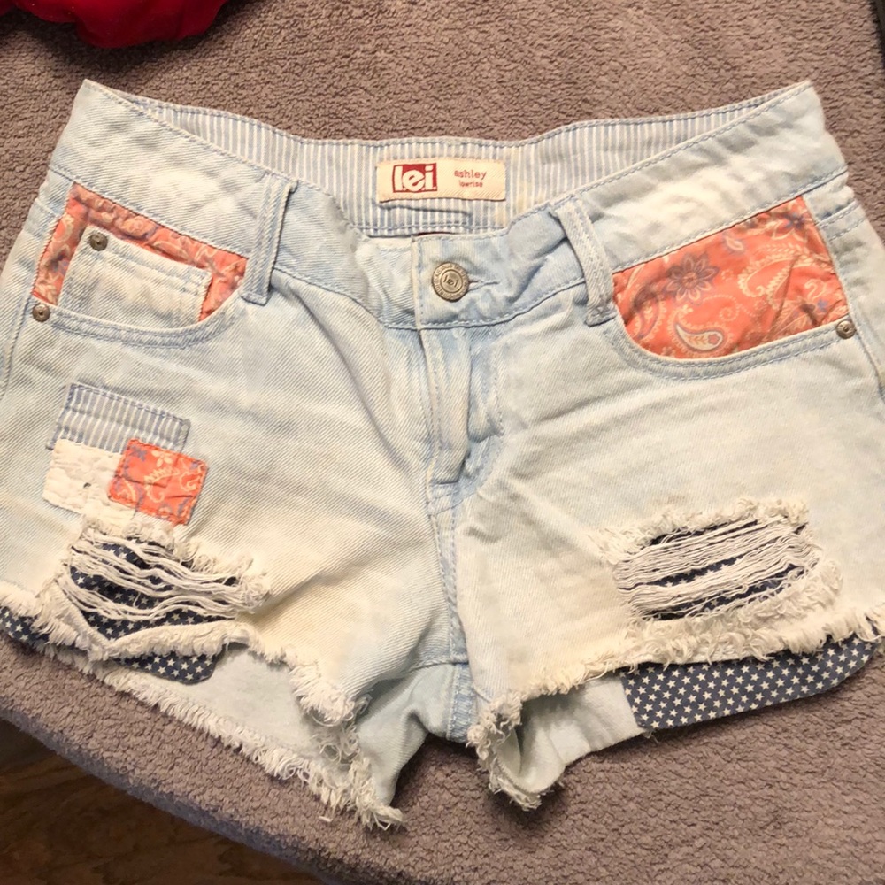 Distressed denim shorts